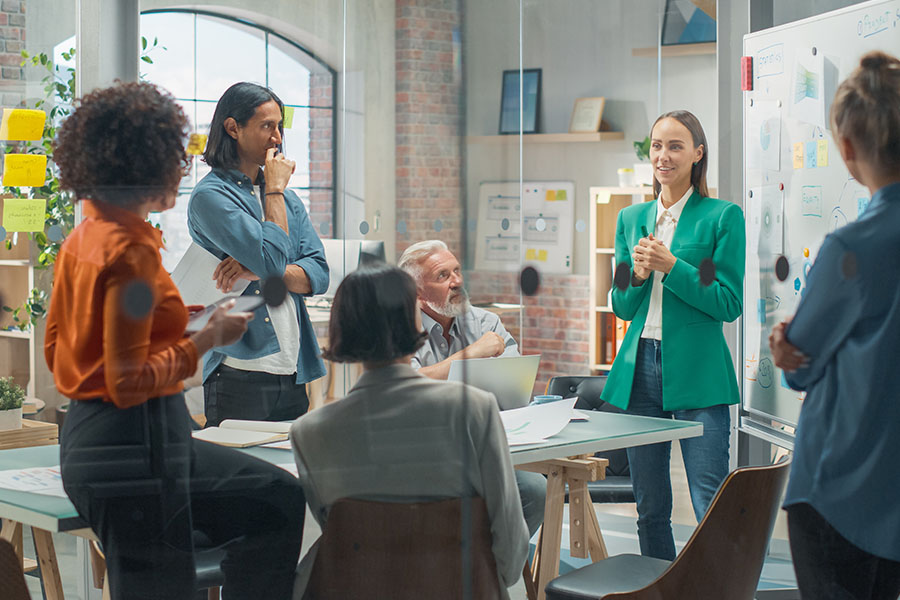 Group of business professionals in a contemporary office space