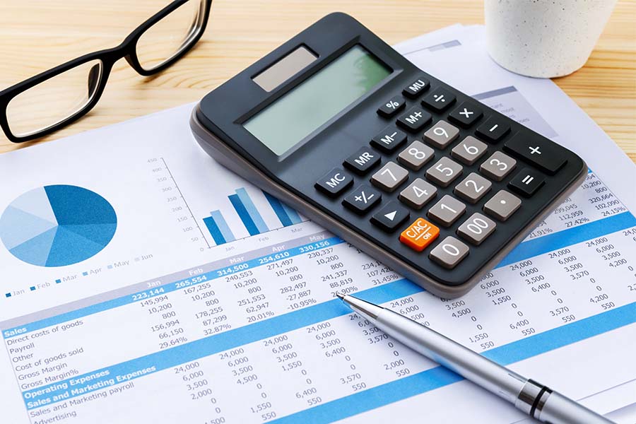 Calculator on spreadsheet printouts