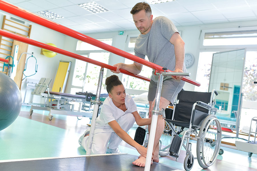 Occupational therapist with wheelchair patient